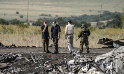 Crash du vol MH17: un premier rapport publié mardi aux Pays-Bas
