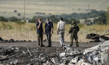 Crash du vol MH17: un premier rapport publié mardi aux Pays-Bas