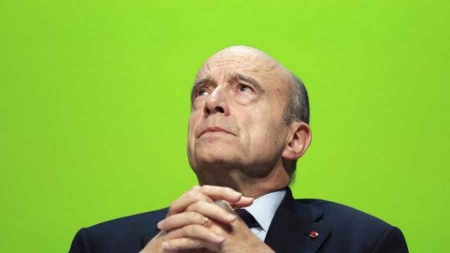 UMP Juppé prépare le gilet pare-balles et le casque à boulons