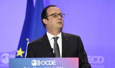 Hollande: un échec de la conférence sur le climat serait “une menace sur le plan économique”