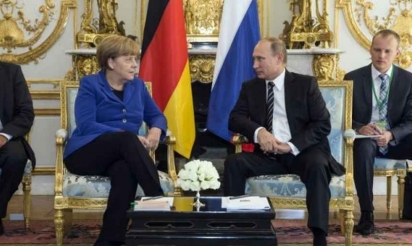 Ukraine: Hollande, Poutine, Merkel et Porochenko réunis à Paris pour faire avancer la paix