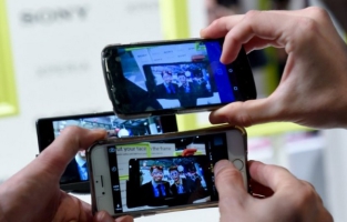 Le smartphone pour remplacer la carte bancaire au distributeur de billet