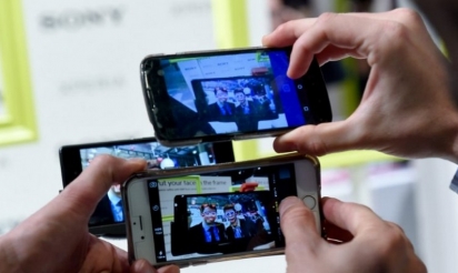 Le smartphone pour remplacer la carte bancaire au distributeur de billet