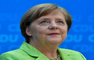 Hamon à Berlin rencontre Merkel et reçoit le soutien de Schulz