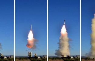  Corée du Nord Kim supervise l'essai d'un nouveau système antiaérien 